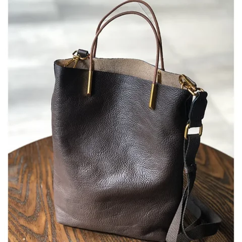 Bolso tipo cubo de cuero genuino para mujer, nuevo bolso Retro de piel de vaca suave natural, bolsos de hombro versátiles de diseñador de alta calidad