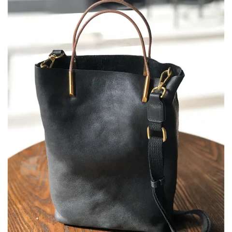 Bolso tipo cubo de cuero genuino para mujer, nuevo bolso Retro de piel de vaca suave natural, bolsos de hombro versátiles de diseñador de alta calidad