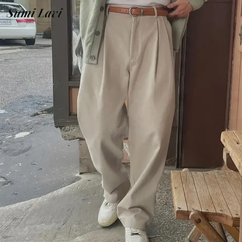 Pantalones de traje para hombre a la moda, ropa de calle, pantalones rectos sueltos plisados de Color sólido Vintage, pantalones informales abotonados de primavera 2025