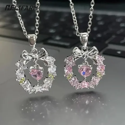 Collares con colgante de lazo para mujer, joyería delicada Y2K, cadena de clavícula con corazón de cristal rosa, Corona de Navidad