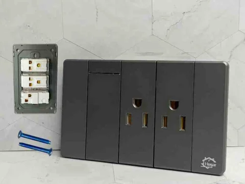 TOMA CORRIENTE DOBLE+APAGADOR LARGO GRIS HL 118V-18- G