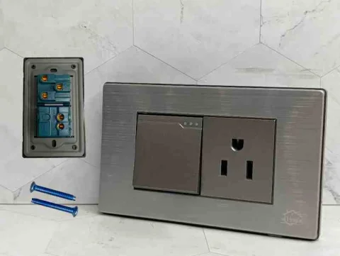 TOMA CORRIENTE+APAGADOR GRIS HL 118K-17