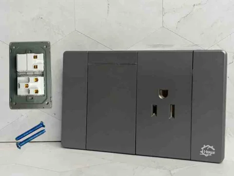 TOMA CORRIENTE+APAGADOR LARGO GRIS HL 118V-17- G