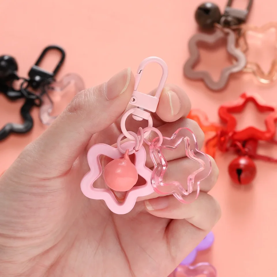 1 Uds. Colgante de estrella hueca con campana pequeña, cuentas acrílicas coloridas, llavero, accesorios, bolso, cordón, llavero, fabricación de joyas