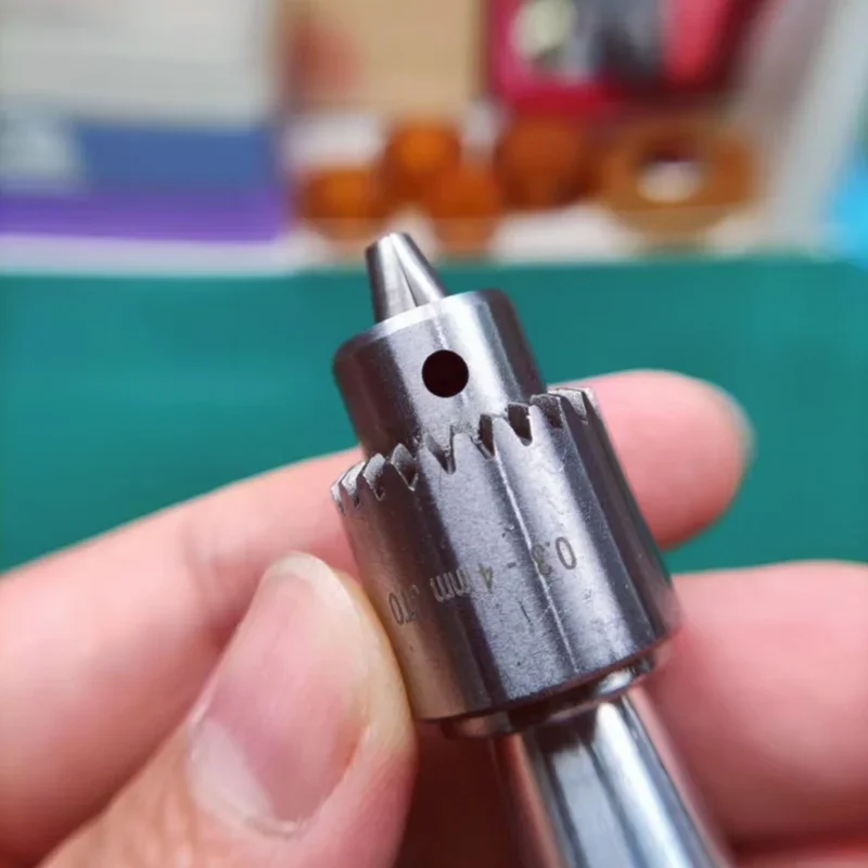 Herramienta de reparación de relojes, eje de rueda, tornillo, cabeza, mango, herramienta de sujeción de broca
