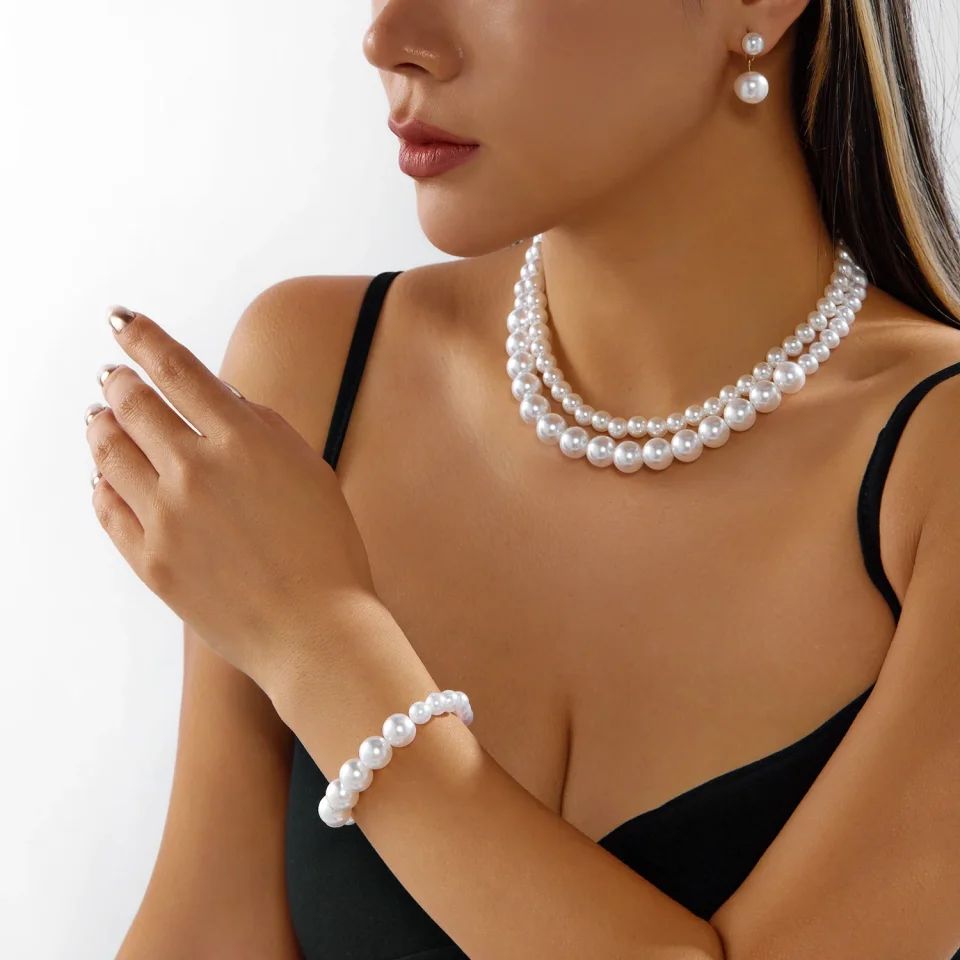 Rinhoo-Conjunto de joyería elegante de perlas de imitación para mujer, collar versátil, pulsera, pendientes, joyería para fiesta y boda
