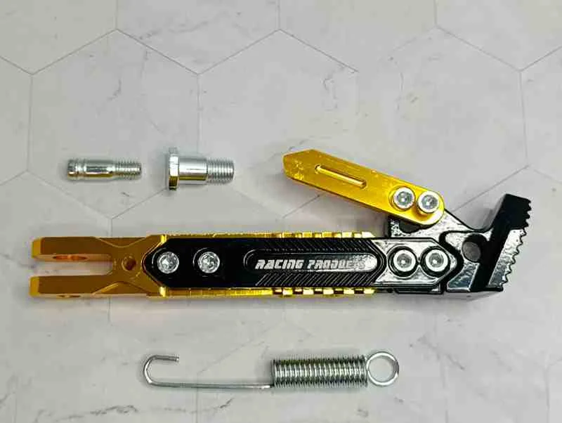 PATA LATERAL P/MOTO DORADO RACING CORTA 13599D